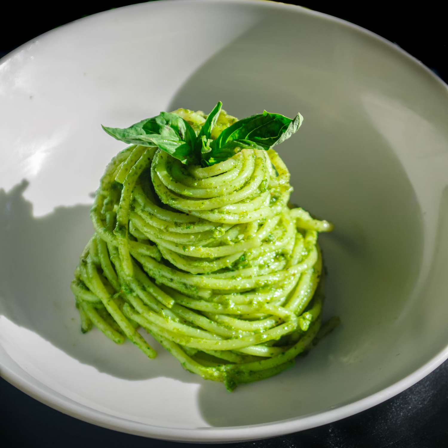photo of a glass of pesto